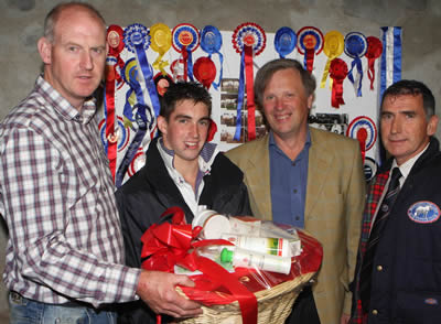 Overall winner of the herds competition was Zara Chestnutt from Bushmills, represented by her brother David, at the NI British Blue Herds competition with Judge Graham Brindley, sponsor Michael Lynch, Botanica and Harold McKee, sec of the NI club at the awards presentation evening held at James and Thomas Martin's farm  forenenst Newtownards, Co Down.